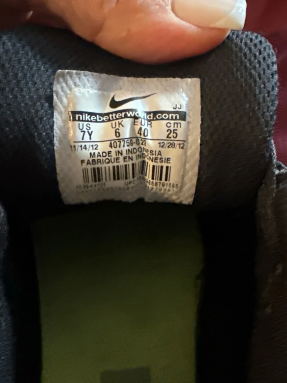 Nike Kids Black Sneakers with Blue Swoosh
